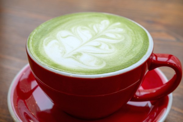 Green Matcha Tea Latte in Red Mug Green is Great